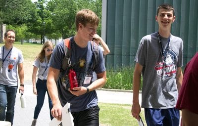 Jack Carswell walks to an activity with fellow Design Camp students.