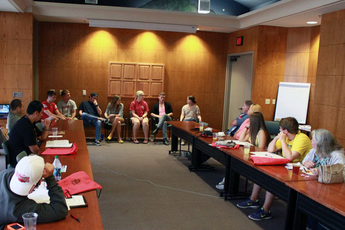 Current Fay Jones School students, from left, Andrew Schalk, Grant Gilliard, Shane Maloney, Laura Cochran, Shaelyn Vinson, Isaac Boroughs and Mary Nell Patterson offer their advice to incoming freshmen during an orientation session in June.
